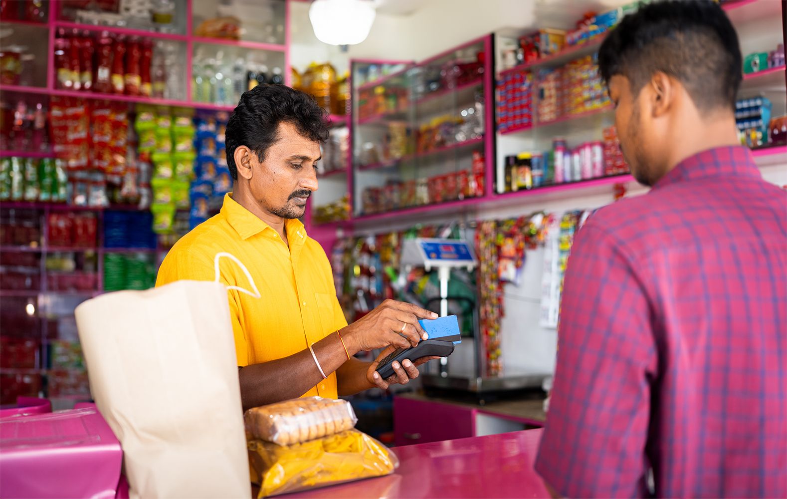 Customer making a payment at one of allpay's partner networks
